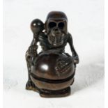 Signed hardwood netsuke skeleton with drum