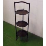 A folding three tier cake stand