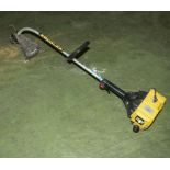 A petrol strimmer