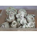 A box of containing china tea ware