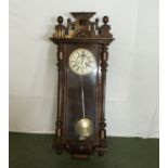 A two weight Vienna wall clock, no weights and a small amount of woodworm