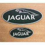 Two cast iron Jaguar plaques