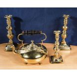 A brass kettle, pair of candlesticks and one other