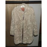 A lady's faux fur coat