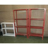 Three metal shelving units