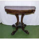 A Victorian mahogany turn over card table