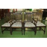 A set of 8 dining chairs in oak 2 carvers and 6