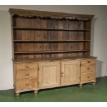 A very large pine kitchen dresser.7ft 6inch wide.6ft 8inch tall.