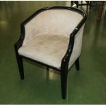 An upholstered tub chair