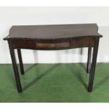 An early 20th century mahogany side table