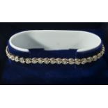 A 9ct gold bracelet set with diamonds, weight 8gms