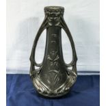 A large French Art Nouveau pewter vase of organic shape in the manner of Hector Guimard depicting