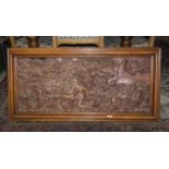 A Burmese teak intricately carved wall plaque of large size depicting hunters and mythical beasts