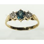 A lady's 9ct gold ring set with sapphire and diamonds