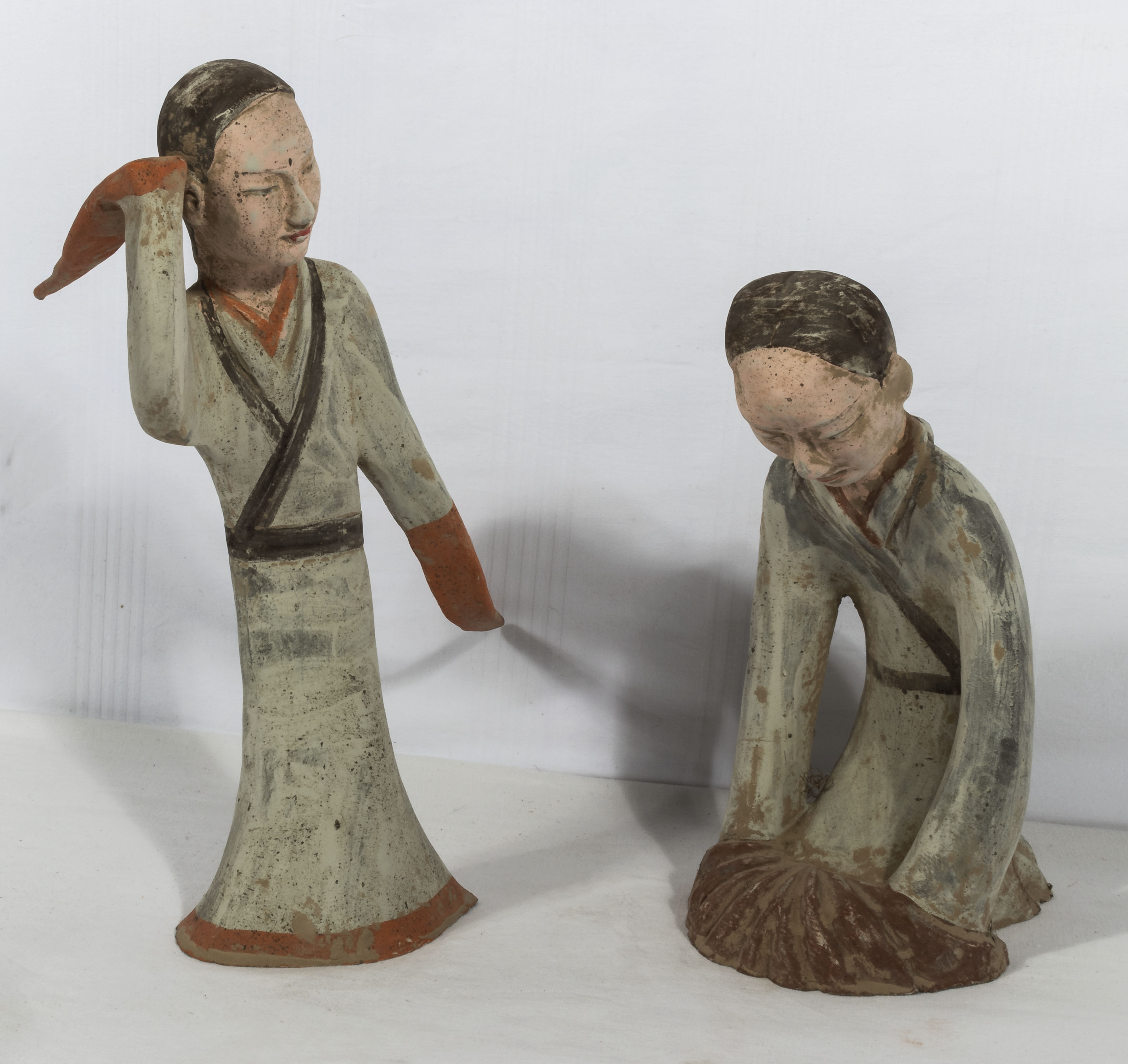 A pair of Tang dynasty style dancing figures