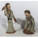 A pair of Tang dynasty style dancing figures