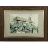 A small framed watercolour depicting a cottage garden scene. signed size 19 x 28cm