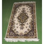 A small slip rug, size 125 x 67cm