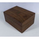 A mahogany stationery box