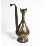 A Turkish brass water jug