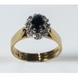 A lady's 18ct gold sapphire and diamond cluster ring