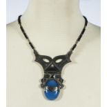 A large silver and blue tribal Tuareg necklace handmade from Niger