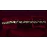 A 9ct gold bracelet set with diamonds, weight 7gms