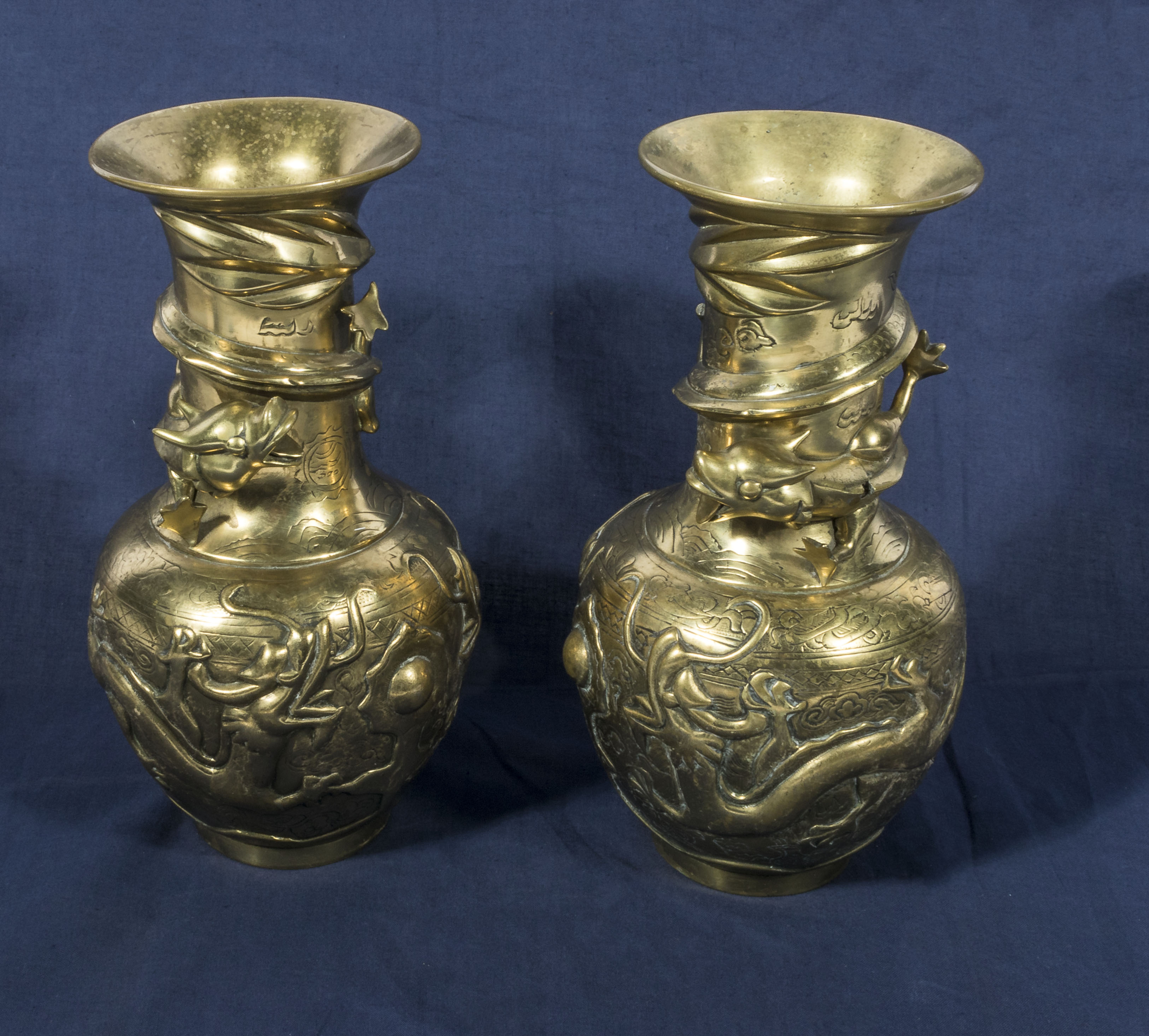 A pair of antique bronze Chinese vases, marked to base