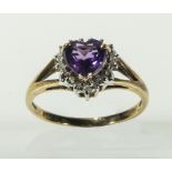 A lady's 9ct gold amethyst and diamond cluster ring, size M