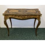 A French ormolu mounted inlaid marquetry table
