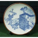 A Meiji Japanese Igezara blue and white charger with pie crust rim