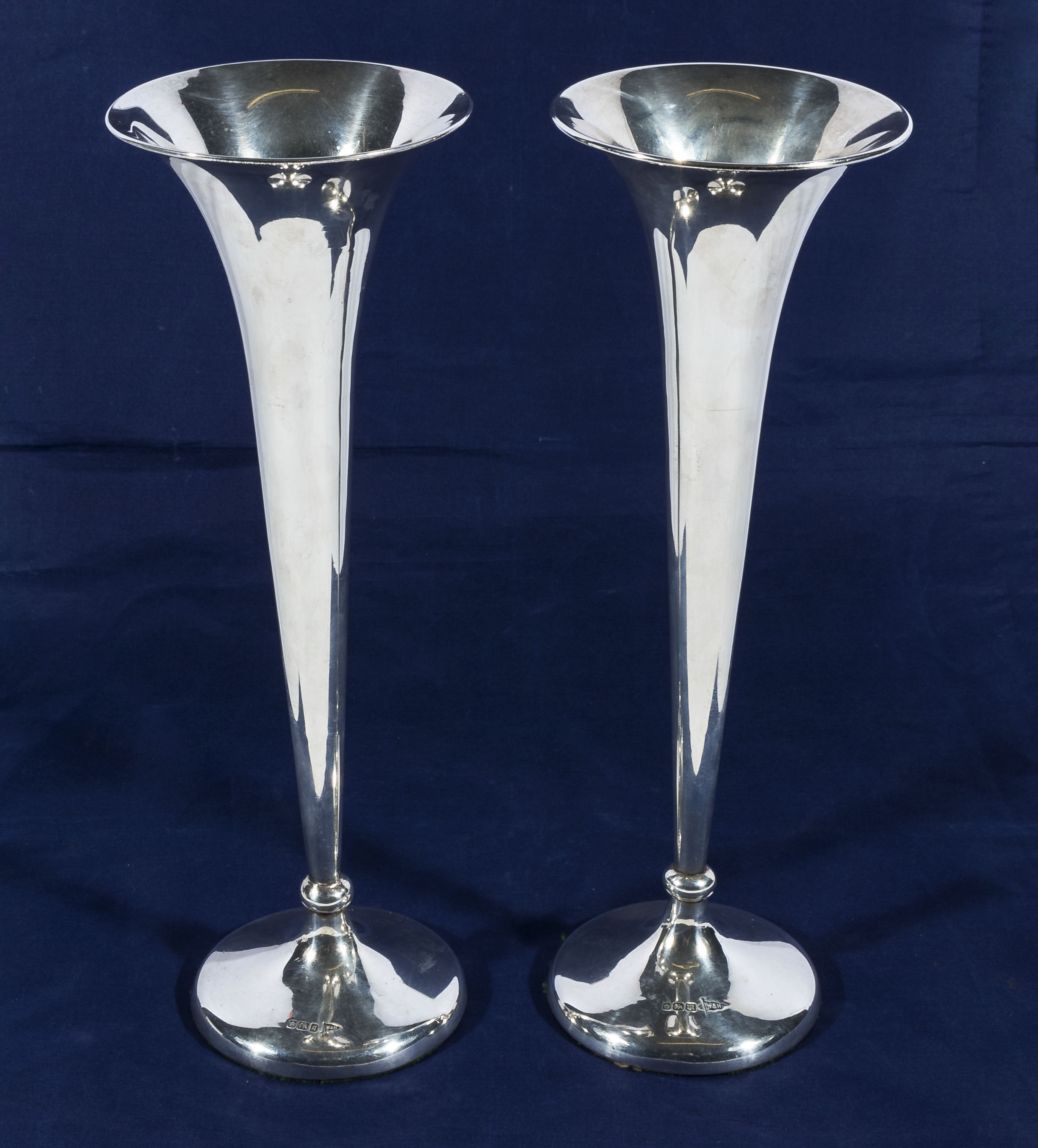 Two large silver vases, hall marks for Birmingham 1911 and 1915