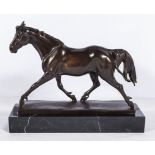 A small bronze horse on marble base