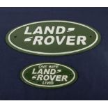 Two Land Rover plaques