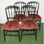 A set of four painted French chairs