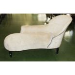 An upholstered chaise longue
