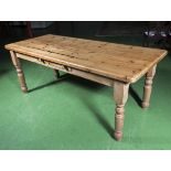 A large pine kitchen table, dimensions length 198cm x width 82cm x height 78cm