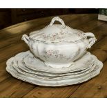 A Victorian tureen with spoon and four ashets