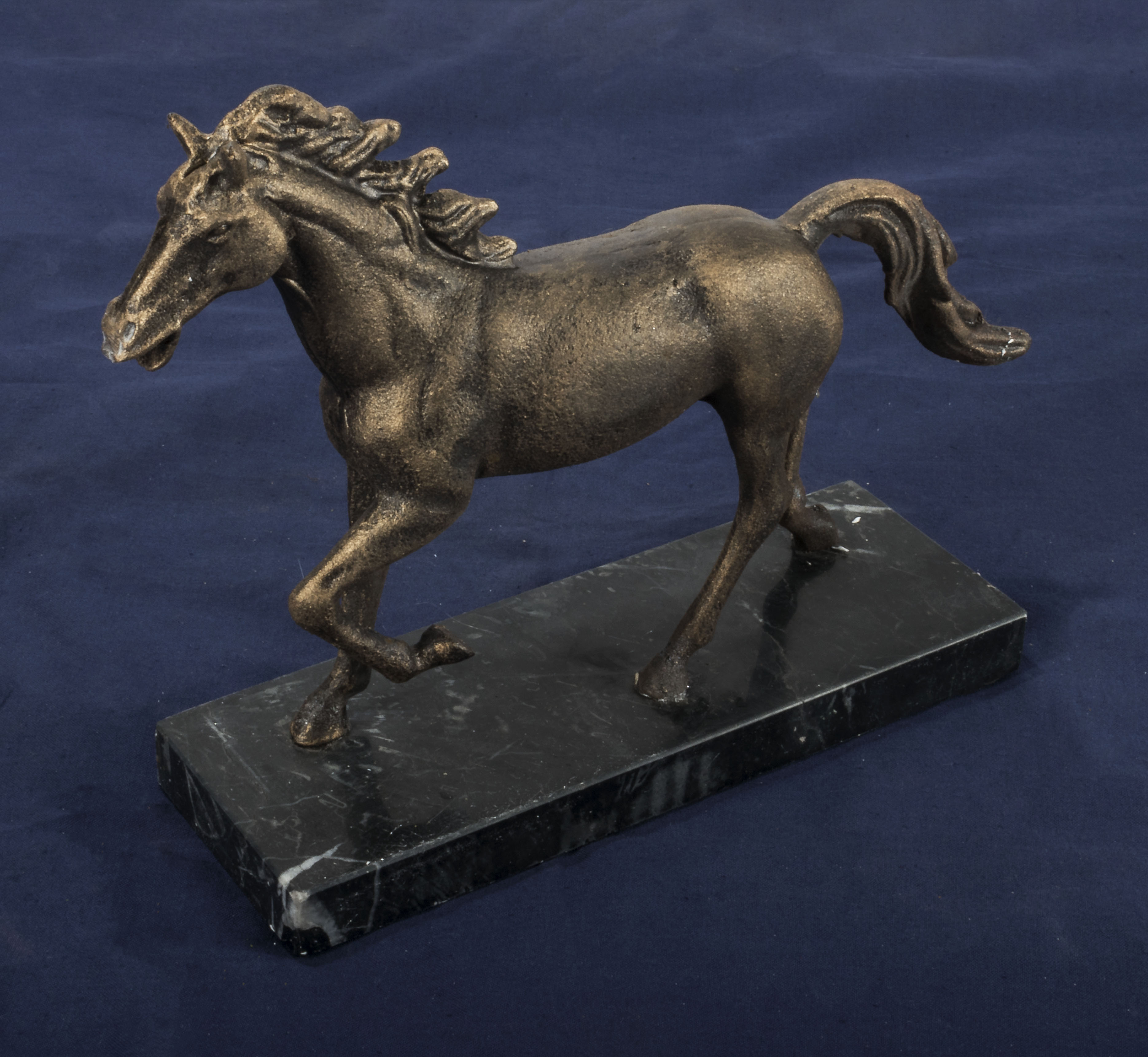 Horse figure on marble base