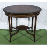 An Edwardian mahogany window table.