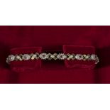 A 9ct gold bracelet set with diamonds and rubies, weight 8gms