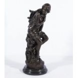 A bronze figure depicting a classical lady