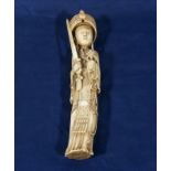 An Oriental ivory figure 23cm tall.