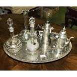 A silver plated tray, three decanters together with a silver plated coffee and hot water pots