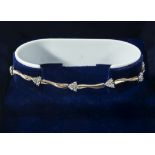 A 9ct gold bracelet set with diamonds, weight 5gms