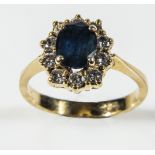 A lady's 18ct gold sapphire and diamond cluster ring, weight 4gms, size O
