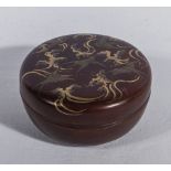 A Japanese lacquer circular box with onlaid swallows to the lid, signed to lid