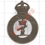 Royal North Devon Hussars pre 1920 bronze cap badge. Die-cast crowned title strap with Lord Rolle’