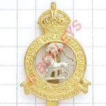 Singapore Volunteer Corps bi-metal cap badge circa 1928-42. Die-stamped British made crowned “