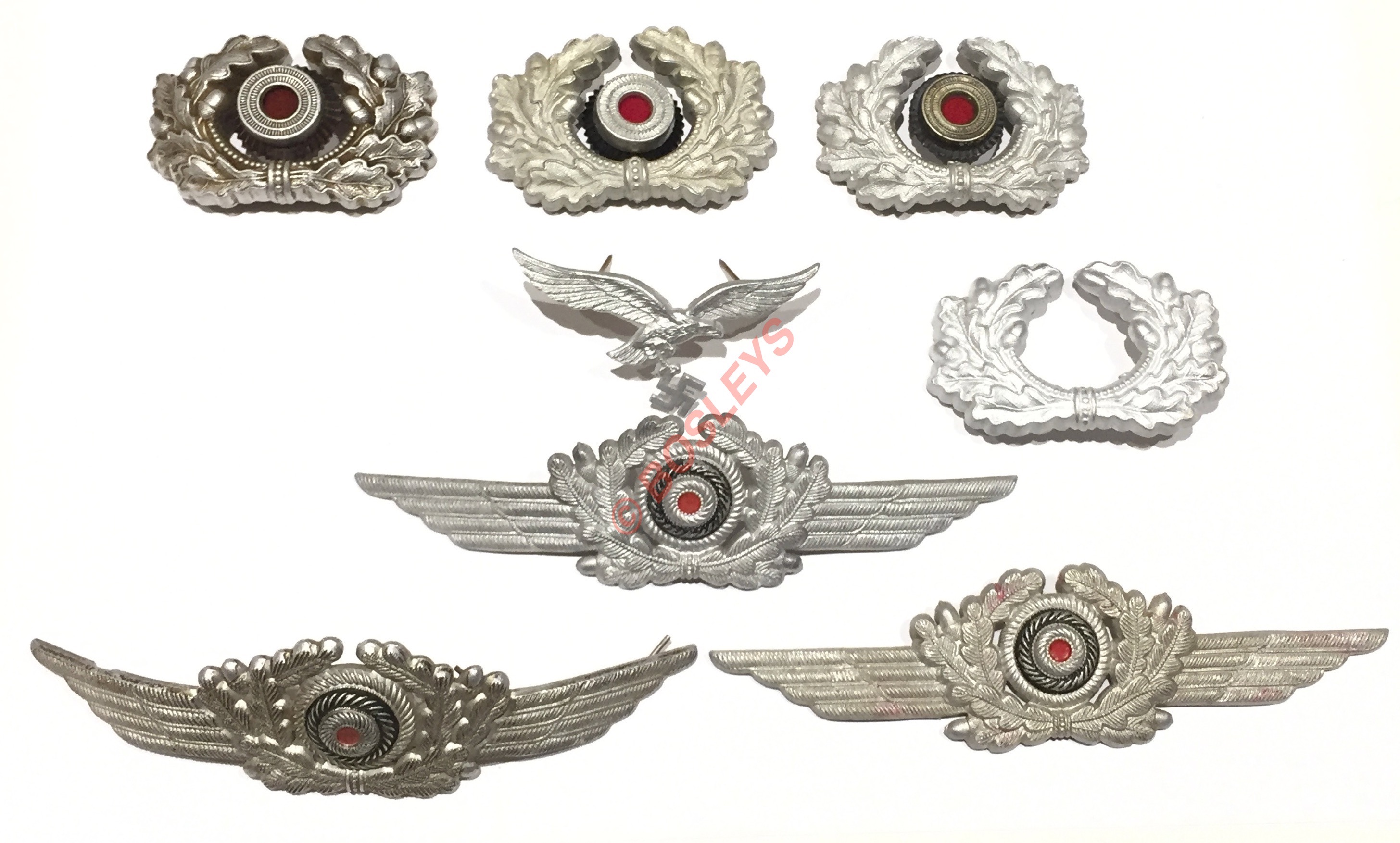 German Third Reich aluminium cap insignia.Army wreath with roundel x 3, Army wreath (one pin